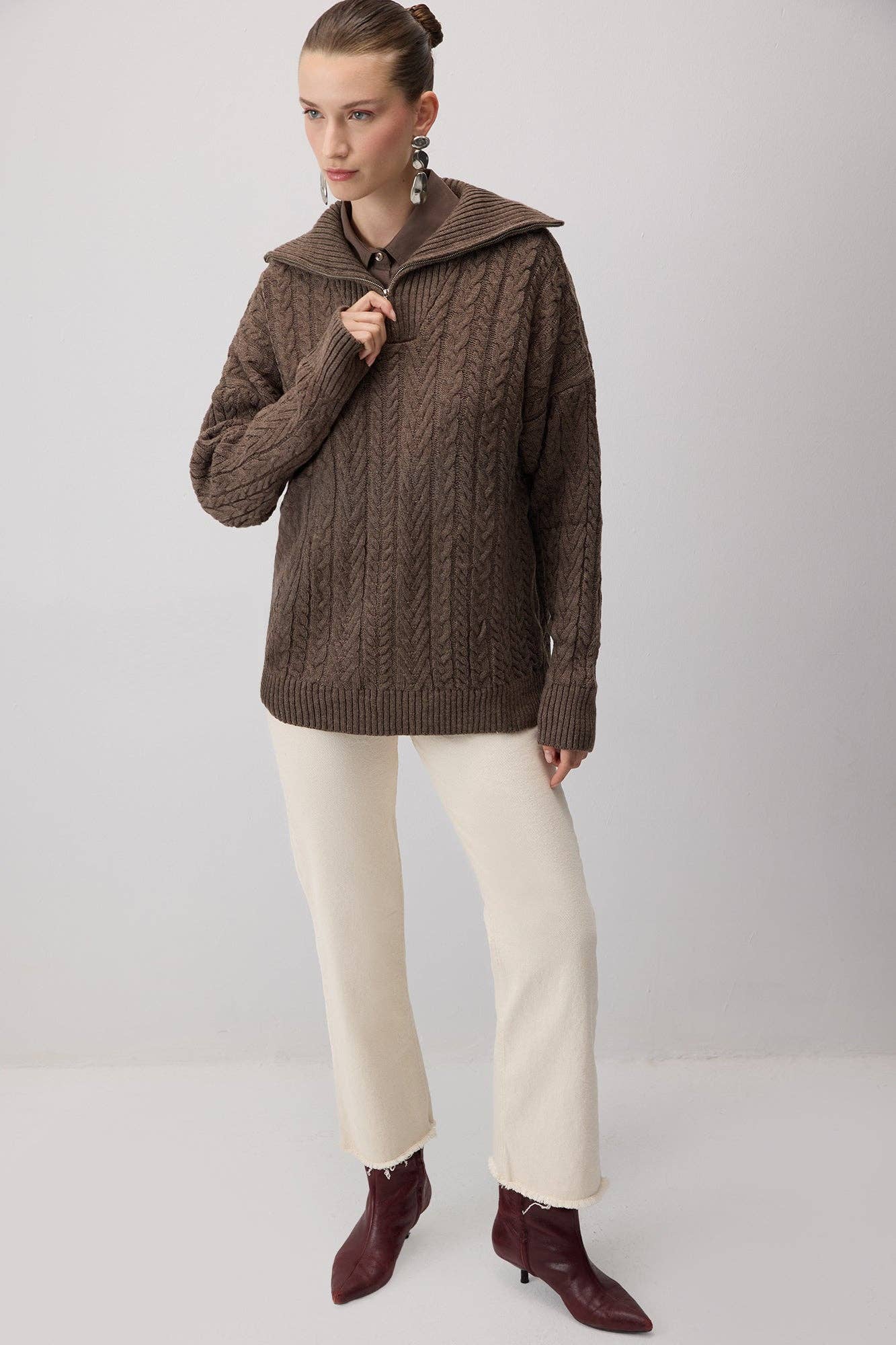 Maglione in maglia a trecce con zip e colletto ampio