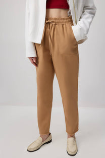 Pantaloni jogger a vita alta in gabardina con coulisse