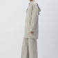 Giacca lunga con cappuccio e zip