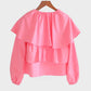 Blusa corta rosa con balze e maniche a sbuffo in misto cotone