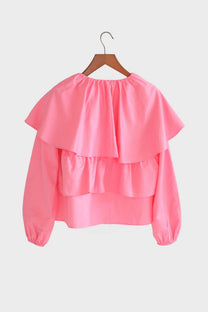 Blusa corta rosa con balze e maniche a sbuffo in misto cotone