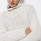 Maglione a trecce con collo alto