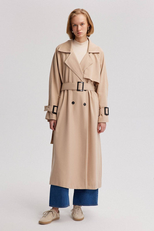 Trench oversize beige con cintura e fibbie