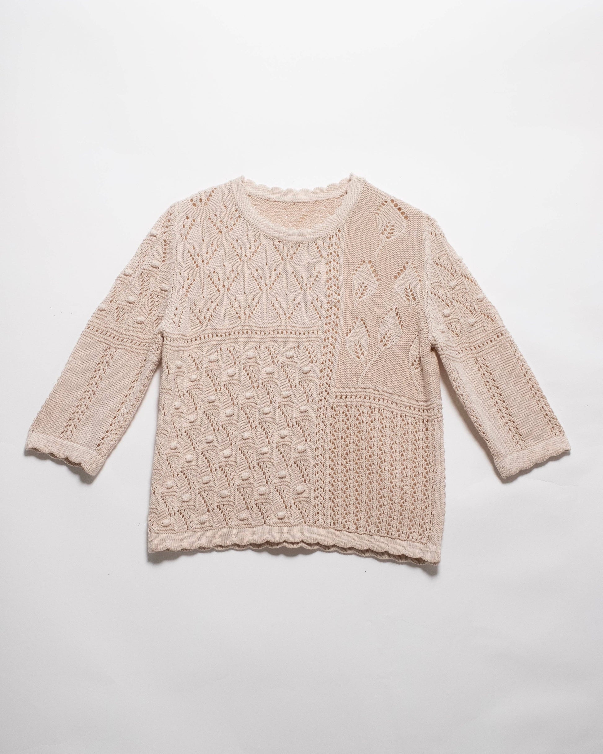 Maglia traforata in cotone con motivo floreale