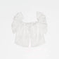 Top bianco Lux con volant e ricami