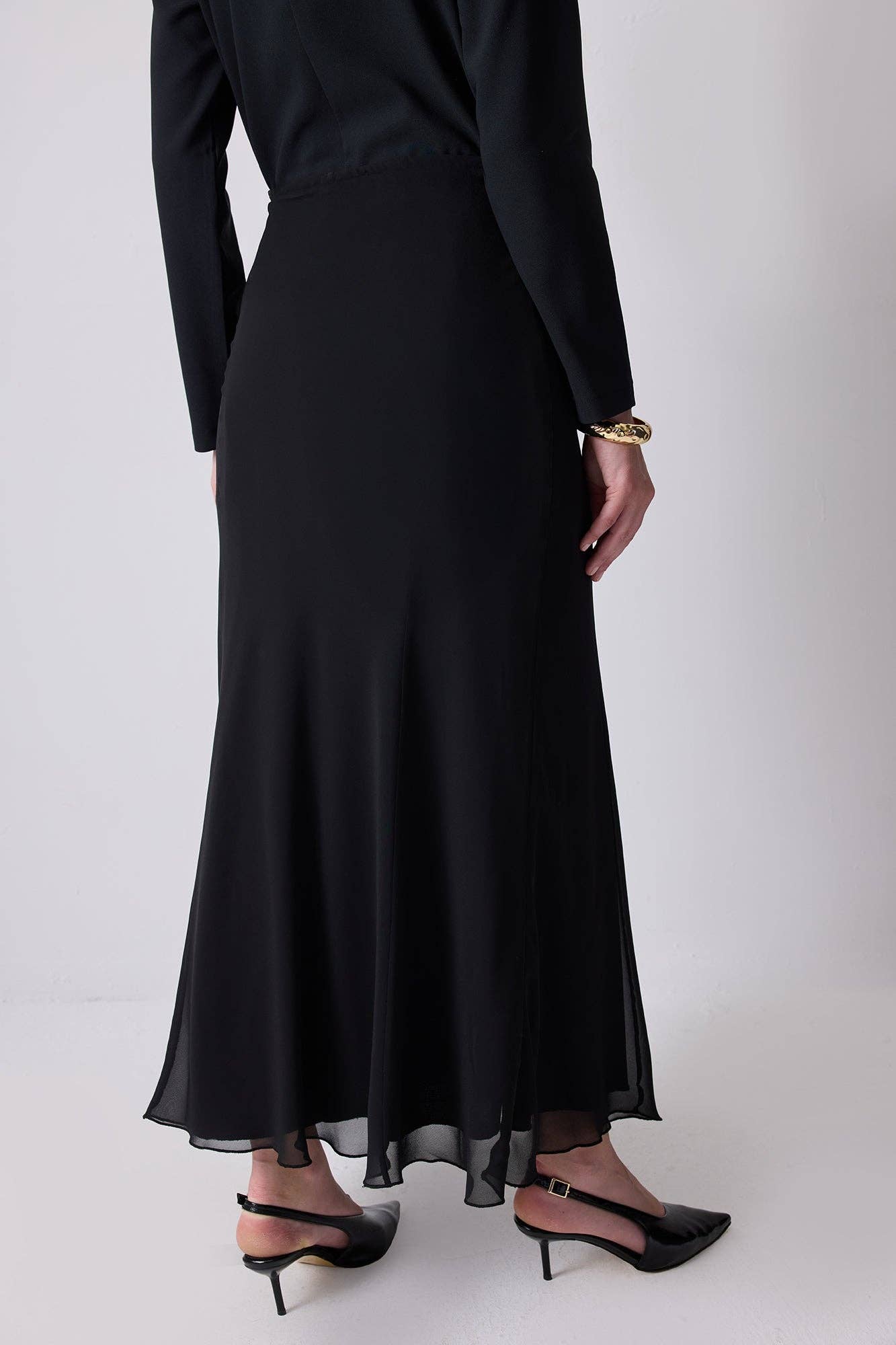 Gonna lunga in chiffon nero con orlo trasparente