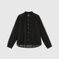 Blusa nera testurizzata con collo alla coreana