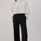 Pantaloni in crêpe con frange