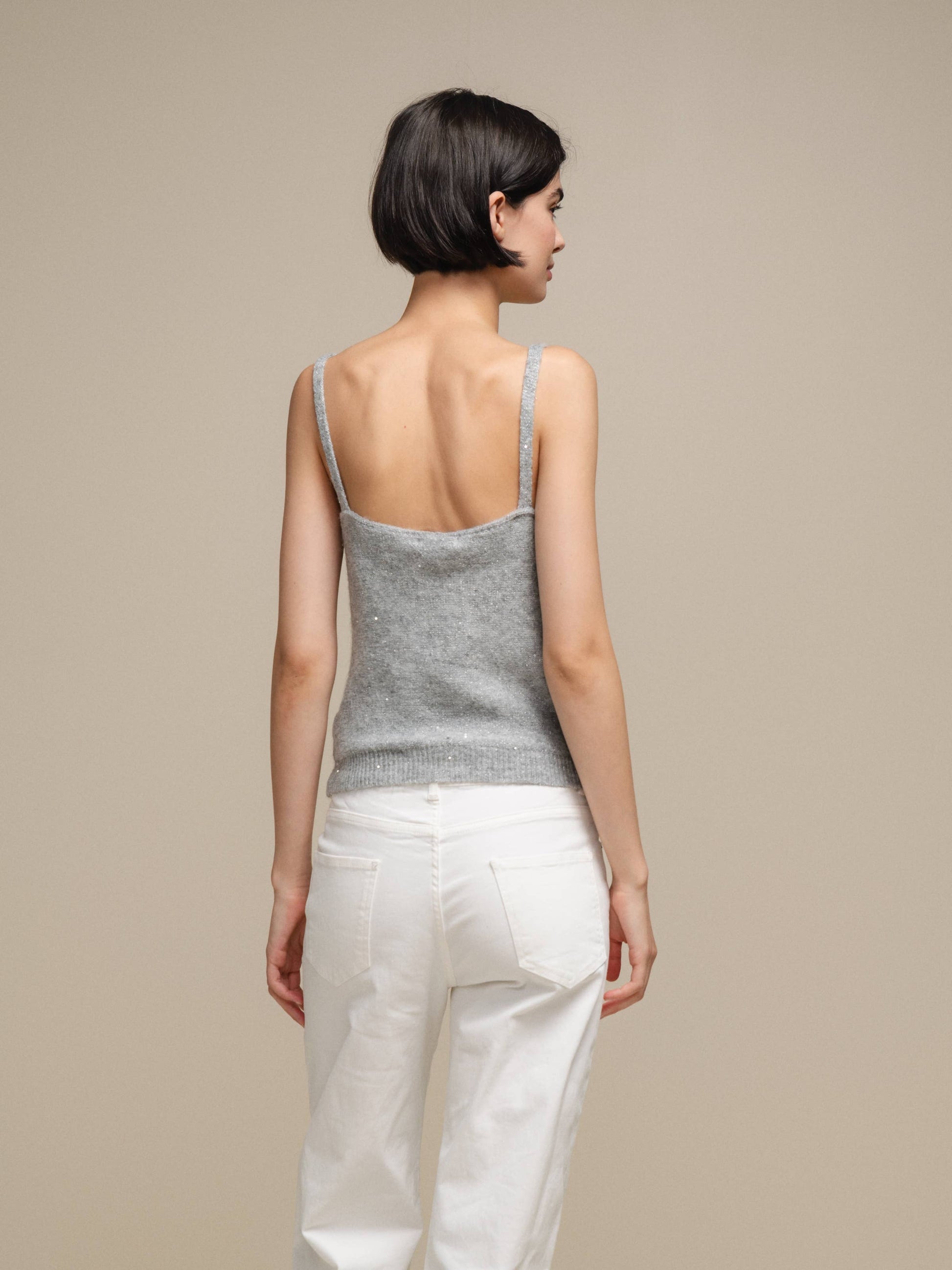 Canotta in maglia lurex versatile con scollo a V