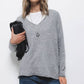 Maglione in maglia rasata con scollo a V
