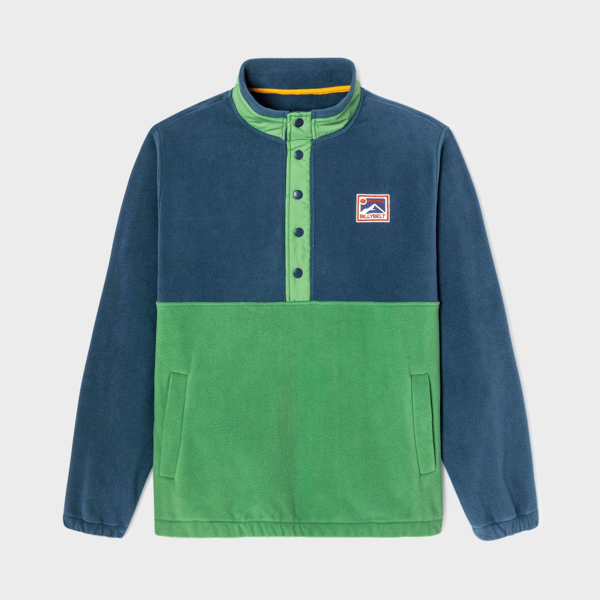 Felpa in pile bicolore blu navy e verde con bottoni
