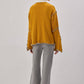 Cardigan in maglia senape con cintura a contrasto