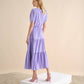 Abito midi in lino con balze e scollo a V