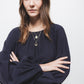 Blusa in tessuto effetto stropicciato con maniche a palloncino