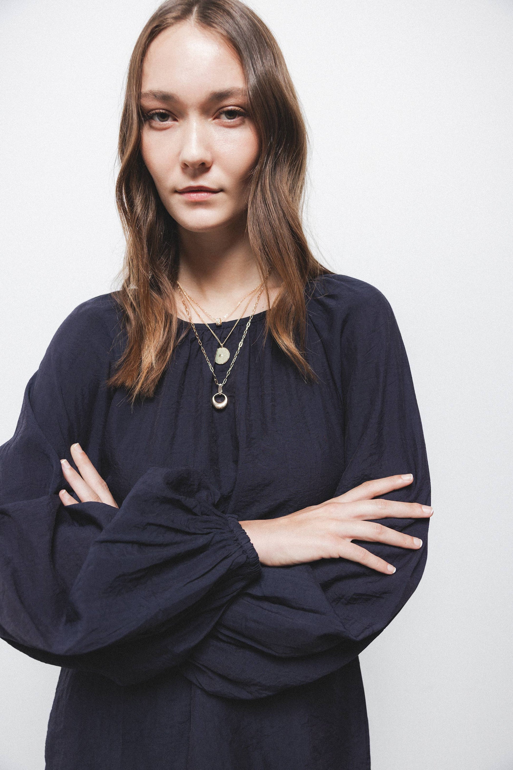 Blusa in tessuto effetto stropicciato con maniche a palloncino