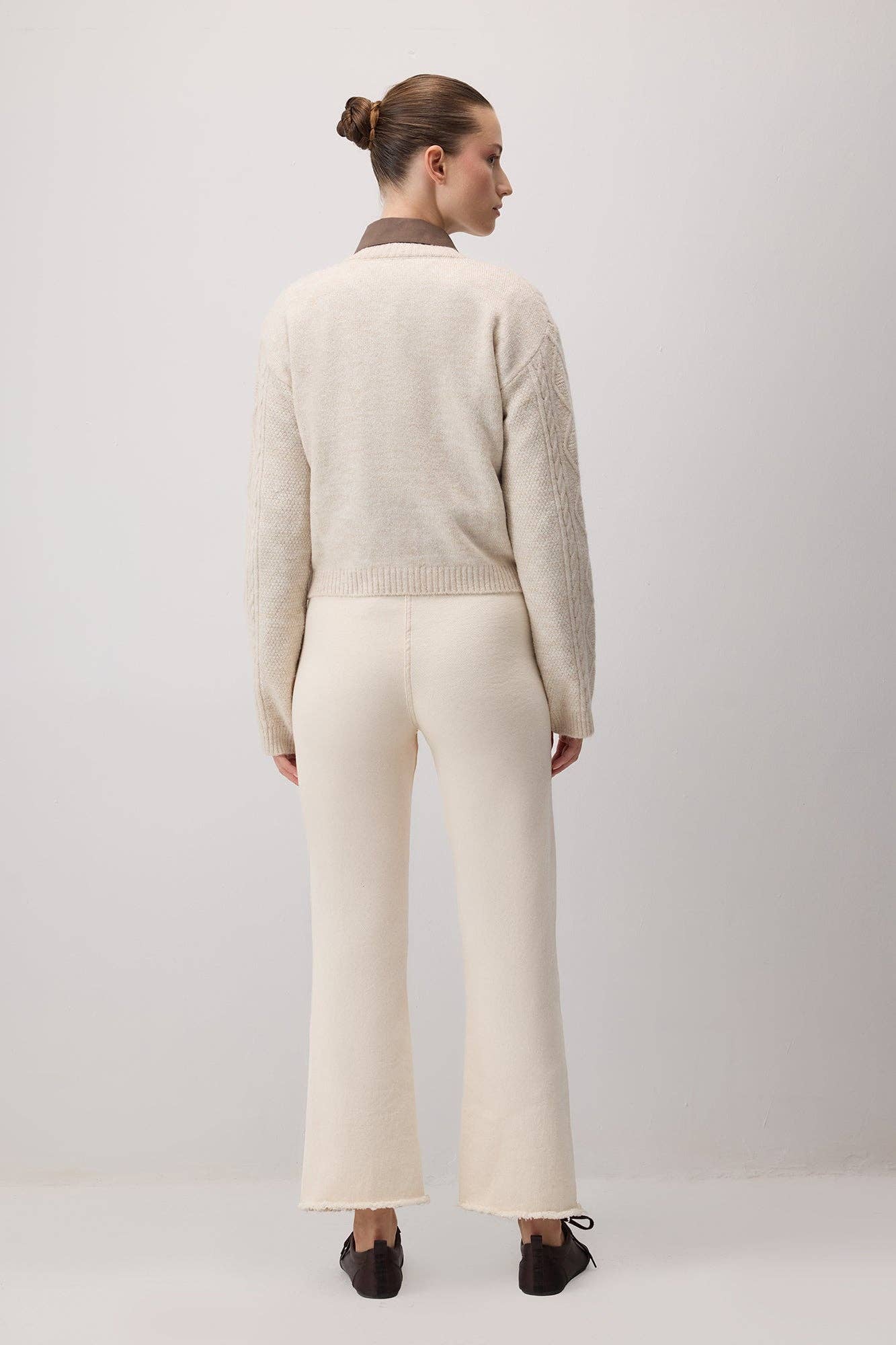 Cardigan in maglia a trecce con bottoni