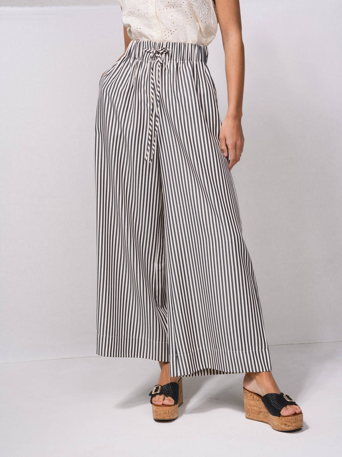 Pantaloni palazzo a righe con vita elasticizzata e laccio