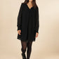 Abito corto in pizzo nero con scollo a V e volant