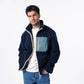 Giacca sherpa unisex con zip bicolore blu navy e verde