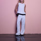 Top smanicato bicolor con bordo a contrasto
