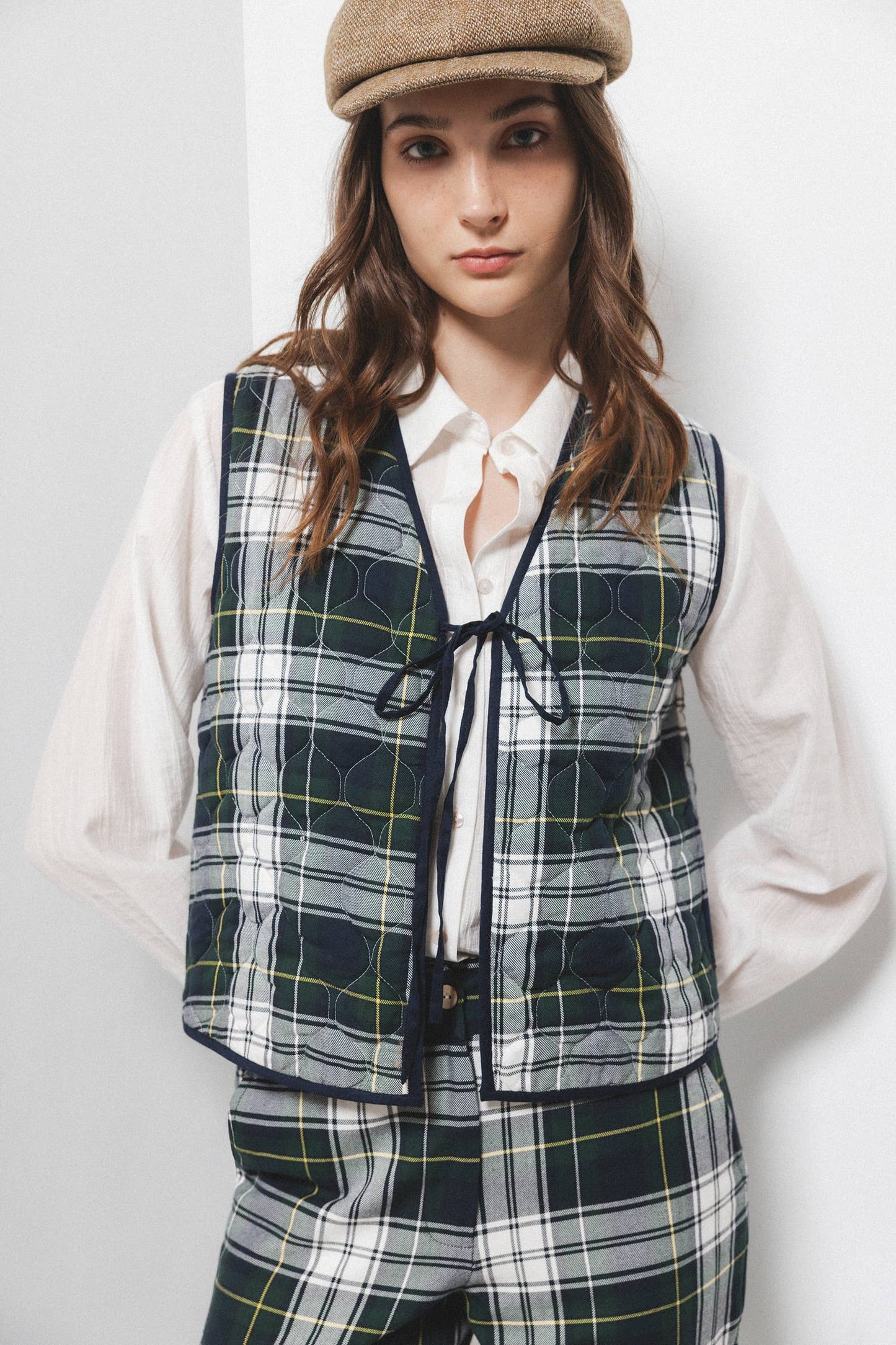 Gilet trapuntato tartan con scollo a V