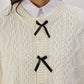 Cardigan in maglia con dettagli a fiocco