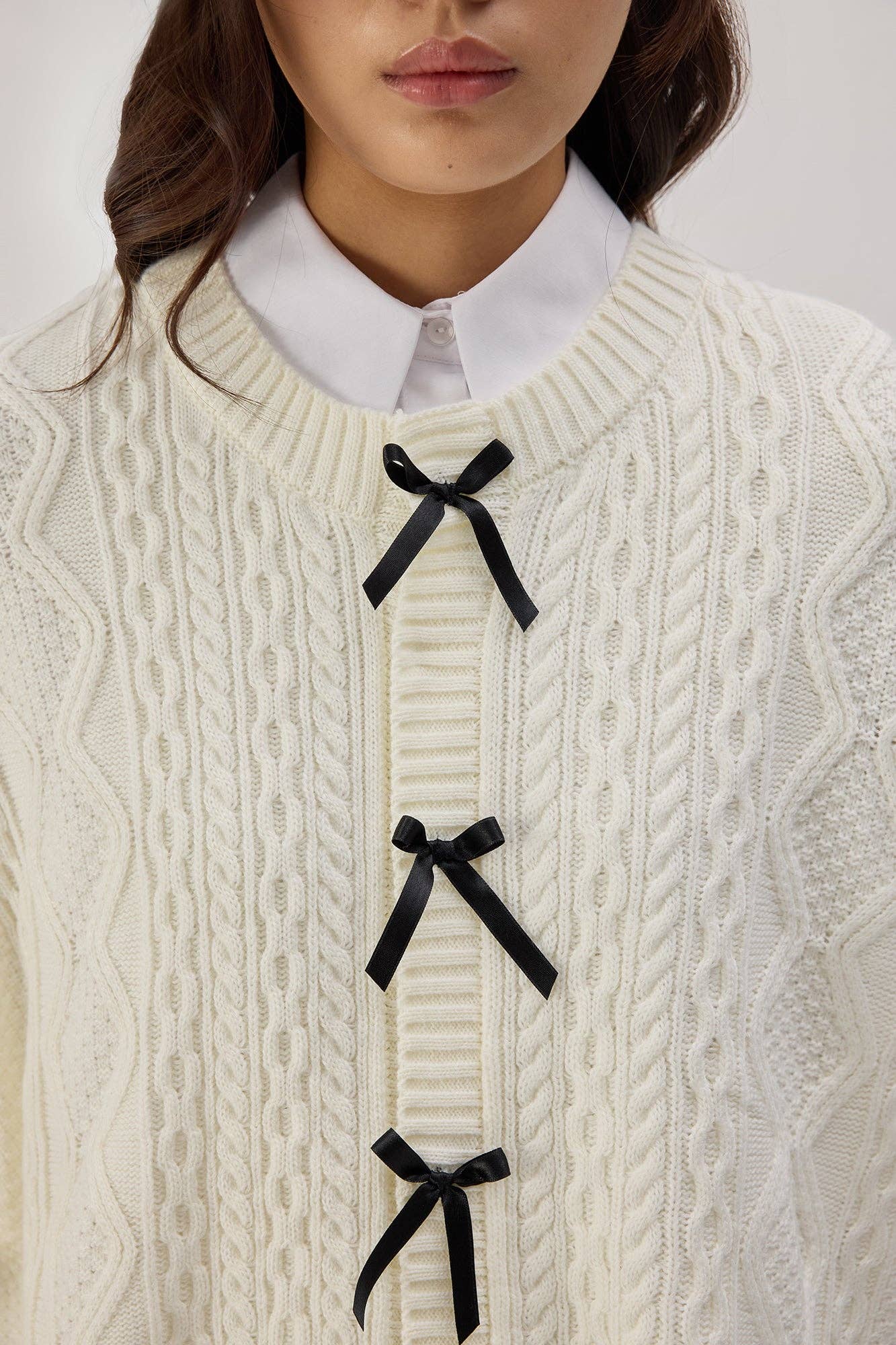 Cardigan in maglia con dettagli a fiocco