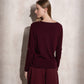 Maglione in maglia scintillante con profilo ondulato