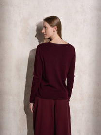 Maglione in maglia scintillante con profilo ondulato