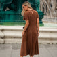 Abito midi in maglia con fiocchi laterali