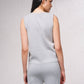 Top in maglia con collo gioiello