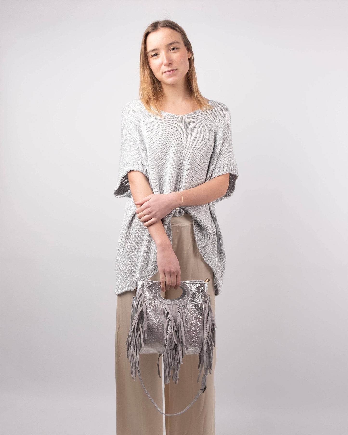 Maglione corto in maglia metallizzata con maniche corte