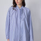 Camicia a righe con collo a fiocco