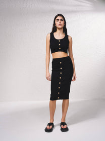 Top corto in maglia a costine con bottoni