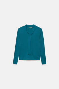 Maglione in maglia rasata con scollo a V e fiocco