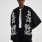 Bomber oversize nero ricamato con motivo floreale