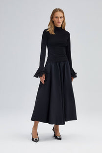 Blusa in maglia con maniche a balze in chiffon