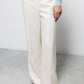 Pantaloni dritti minimal con tasche oblique