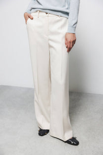 Pantaloni dritti minimal con tasche oblique