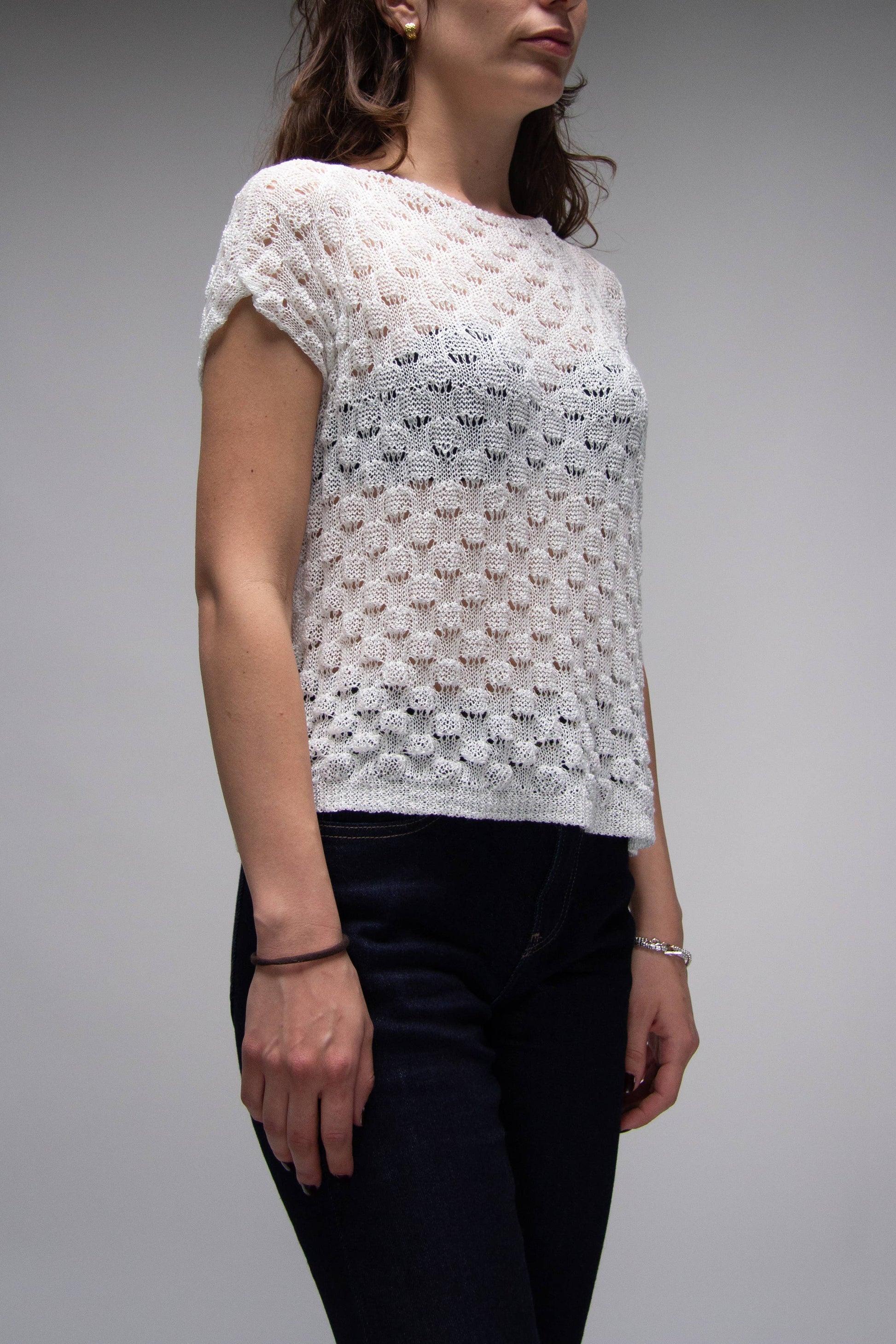 Top corto in crochet traforato dal fit ampio