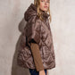 Cappa imbottita oversize con cappuccio e zip