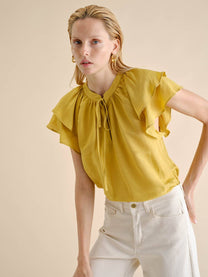 Blusa in lino con volant