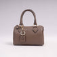 Borsa bauletto in pelle martellata con tracolla