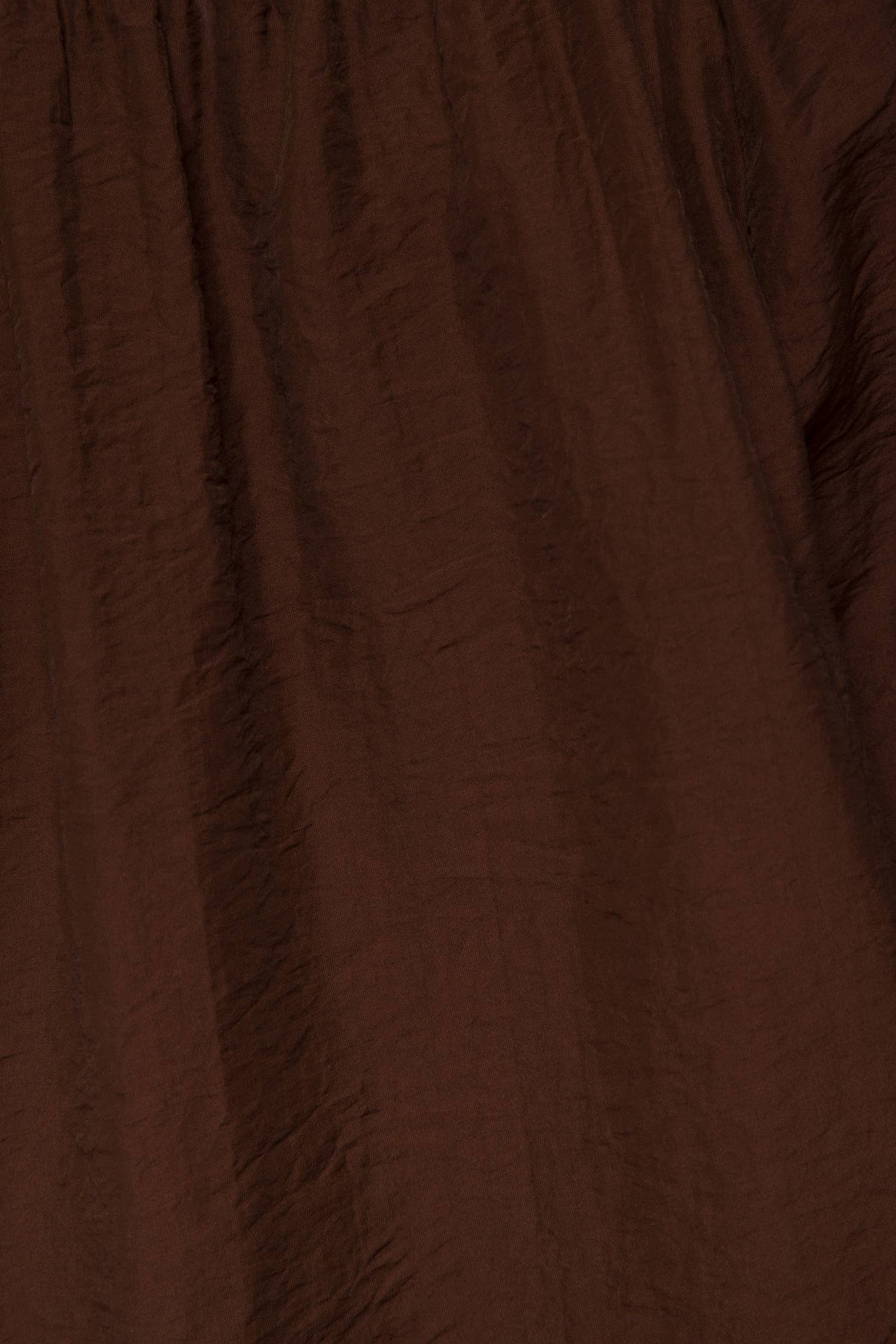 Blusa effetto stropicciato con maniche a palloncino