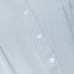 Top smanicato con collo alla coreana e volant