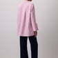 Camicia a righe rosa con polsini ampi