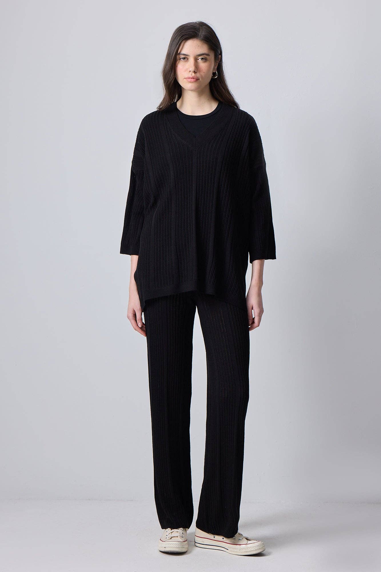 Completo in maglia nero con tunica e pantaloni