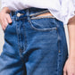 Jeans a vita alta wide leg con strass e strappi