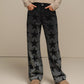 Jeans donna a gamba ampia con stampa stelle