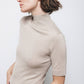 Maglione dolcevita a maniche tre quarti in maglia rasata